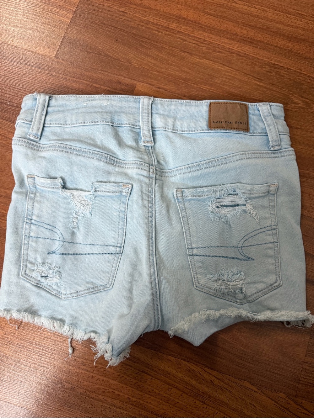 Light Wash Distressed American Eagle Women’s Denim Shorts - Picture 2 of 4